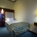 <?php echo $hotelname_visible; ?> bedroom